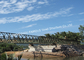 Полуфабрикат мост Байлей стальной для моста структурной стали проекта охраны природы воды портативного с поддерживая пристанями поставщик